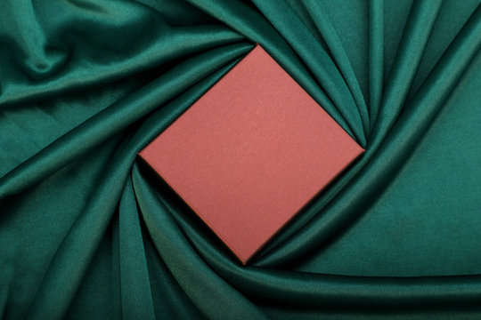 Blank Gift Box on a Satin Fabric for Mockups