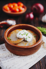 Potato pancakes with sour cream