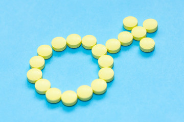 Men Symbol. Male Sign. gender icon of pills on blue background. Medical concept