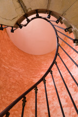 Below retro spiral stairs