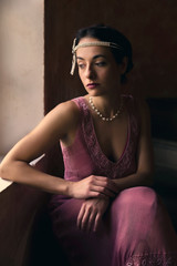 Nostalgic lady at window