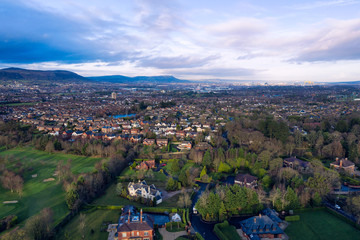 aerial view of  Autumn countryside to the city during  sunset time, Northern Ireland