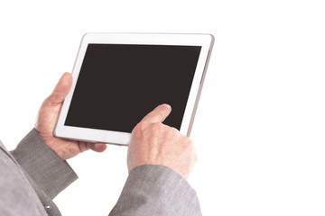 close up.businessman pointing finger at the blank screen tablet.