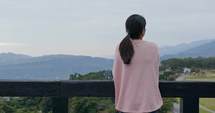 Woman enjoy the view in Luye highland at Taitung