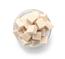Refined sugar in glass bowl on white background