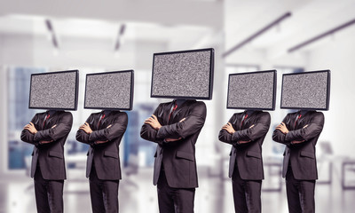 Businessmen with TV instead of head.