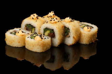 various sushi, rolls on a black background with reflection. especially for cafes and restaurants