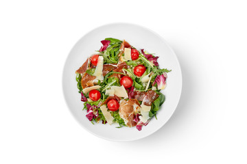 fresh vegetable salad with ham in a bowl isolated on white background