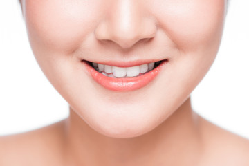 Obraz na płótnie Canvas Close up of smile of young asian woman with great healthy white teeth