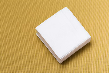 Fototapeta premium paper napkin on textured background.