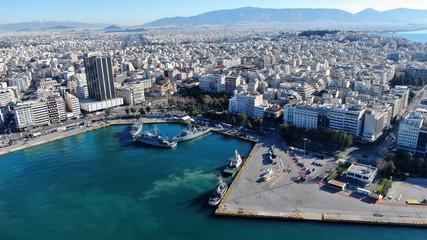 Fototapeta na wymiar Aerial drone photo of famous Christian ceremony of Epiphany in main port of Piraeus