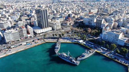 Obraz na płótnie Canvas Aerial drone photo of famous Christian ceremony of Epiphany in main port of Piraeus