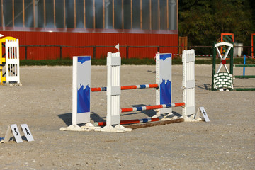 Fototapeta na wymiar Photo in horizontal position of hurdles for riding trainings