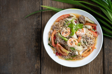 Mama salad on a white plate