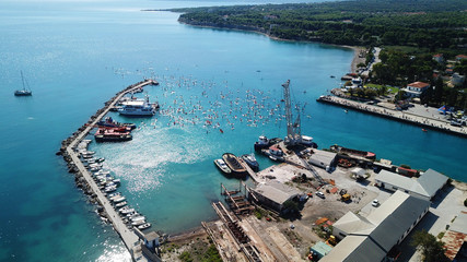 Aerial bird's eye view photo taken by drone of stand up paddle surfing or SUP competition in...