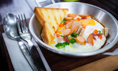 Egg pan menu, fried egg, sausage bread