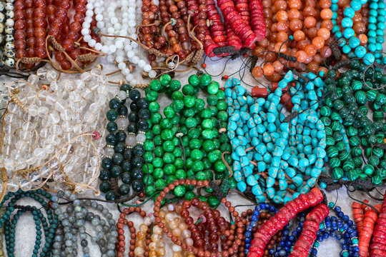 Multi-colored bracelet made of quartz, rubies, malachite and turquoise beads.