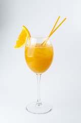 orange cocktail with orange slice on white background
