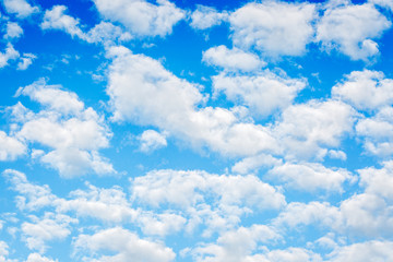 Naklejka na ściany i meble Pattern of white clouds on blue sky