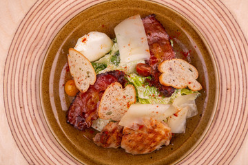 Caesar Salad with bacon and toasts