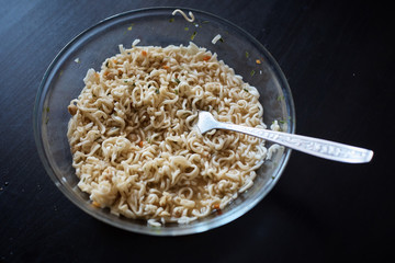 Instant noodles on wood baord