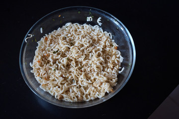 Instant noodles on wood baord