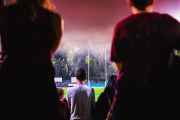 Cheering fans, American football, rugby to win 