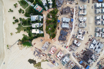 Aerial view of the luxury apartments construction site on shore beach near the sea - Image