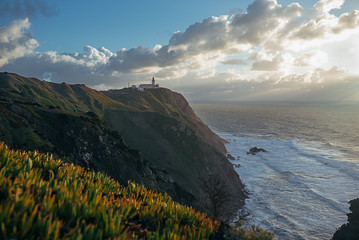 Portugal. Cabo da Roca and the lighthouse over Atlantic Ocean, the most westerly point of the European mainland.