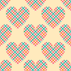 Pastel colored tartan checkered hearts on beige seamless pattern, vector