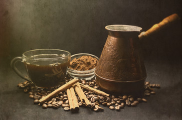 Still life with coffee and cinnamon in retro style