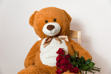 Big Teddy Bear holding red rose bouquet, romantic gift surprise, Valentines day, anniversary,love