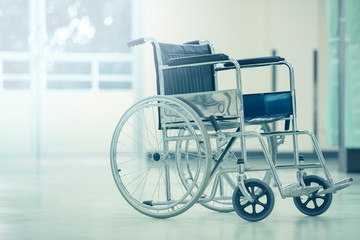 Fototapeta na wymiar Empty wheelchair for patients