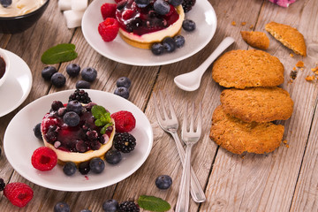 Cheesecakes with mixed berries.