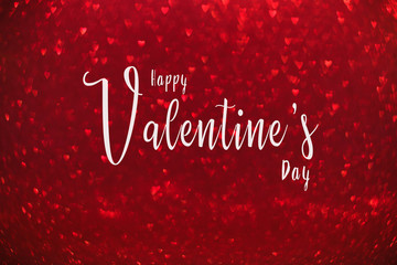 Red heart glitter bokeh background and text Happy Valentine's Day. Love and Valentine's day concept.