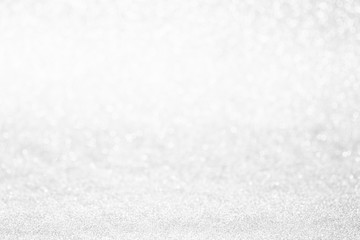 Glitter christmas abstract background. Winter christmas bokeh lights defocused.