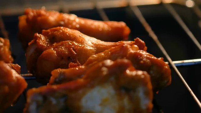 4K Baking hot and spicy grill chicken wings in the oven with grain processed