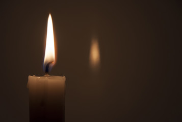 Candle flame on a dark background