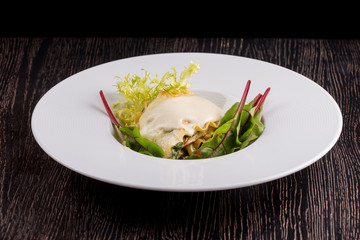 Mushroom lasagna with greens.