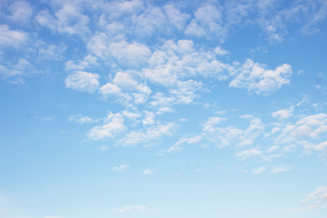 Bright blue sky with white clouds