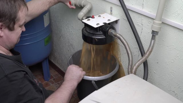 Plumber doing flushing water system.
