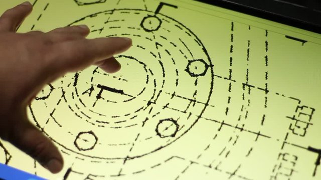 Hand checks electrical diagram on the touchscreen. A circuit diagram (electrical diagram, elementary diagram, electronic schematic) is a graphical representation of an electrical circuit.