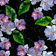 Beautiful violet flowers embroidery seamless pattern. Template for clothes, textiles, t-shirt design