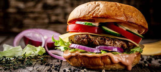 hamburger with bacon and cheese. menu photo, copy space