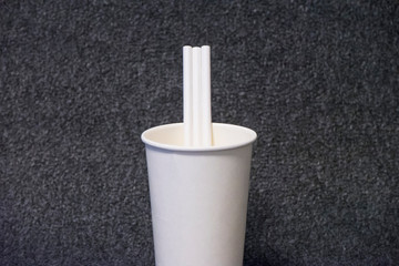 paper glass with a paper straw