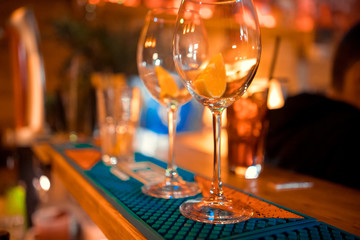 Bartender preparing alcoholic aperitif, aperol spritz cocktail