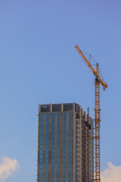 Building under construction with crane