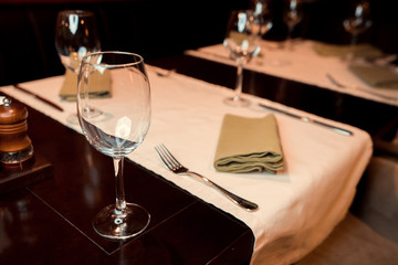 Empty glasses in restaurant, black and white photo