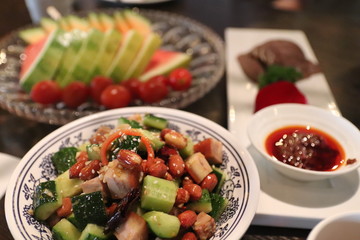 Traditional china meat salad among other chinese dishes