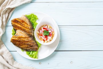 crispy gourami fish with spicy salad